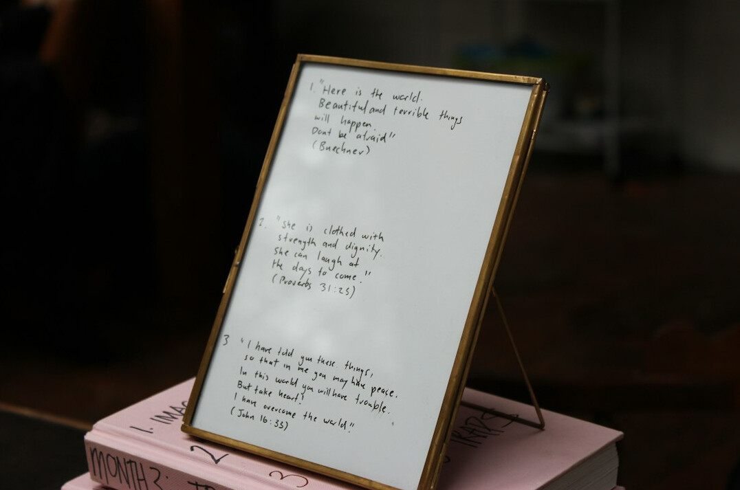 Whiteboard covered with a hand-drawn flowchart diagram